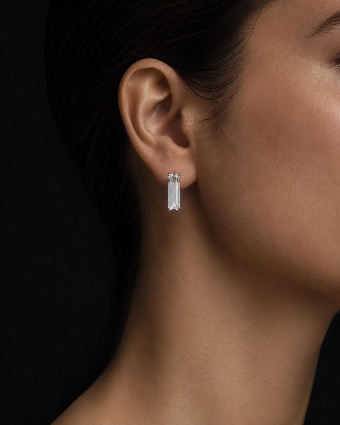 Baguette-cut diamond earring on model
